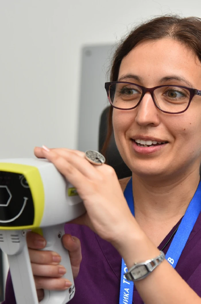 Smiling doctor with device